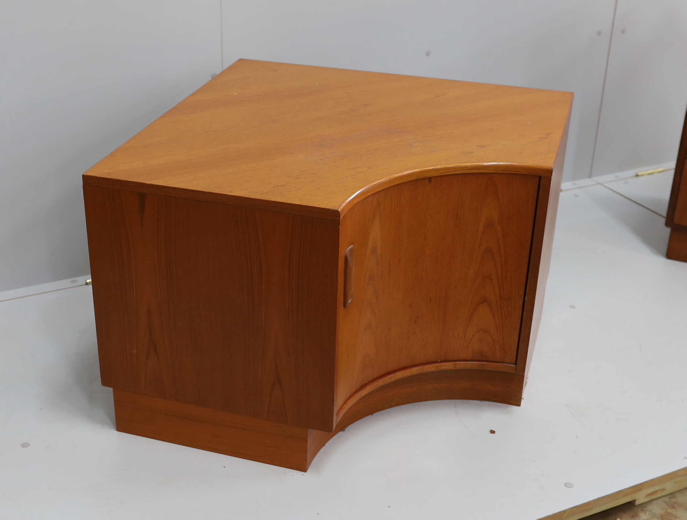 A mid century G Plan Fresco teak low corner cupboard, width 107cm, depth 87cm, height 54cm